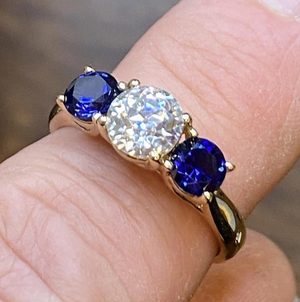 Fiorese moissanite and sapphire ring