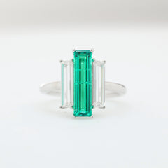 14K White Gold Baguette Cut Emerald Three Stone Ring with Lab Diamond Side-stones - MMR
