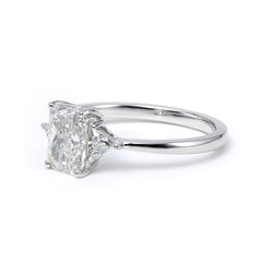 14K White Gold 1.5ct Radiant Cut Lab Diamond Three Stone Ring with Triangular Cut Lab Diamond Side Stones and Tapered Band Design