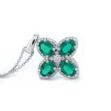 Platinum Oval Cut Lab Colombian Emerald Four-leaf Clover Lab Diamond Halo Necklace