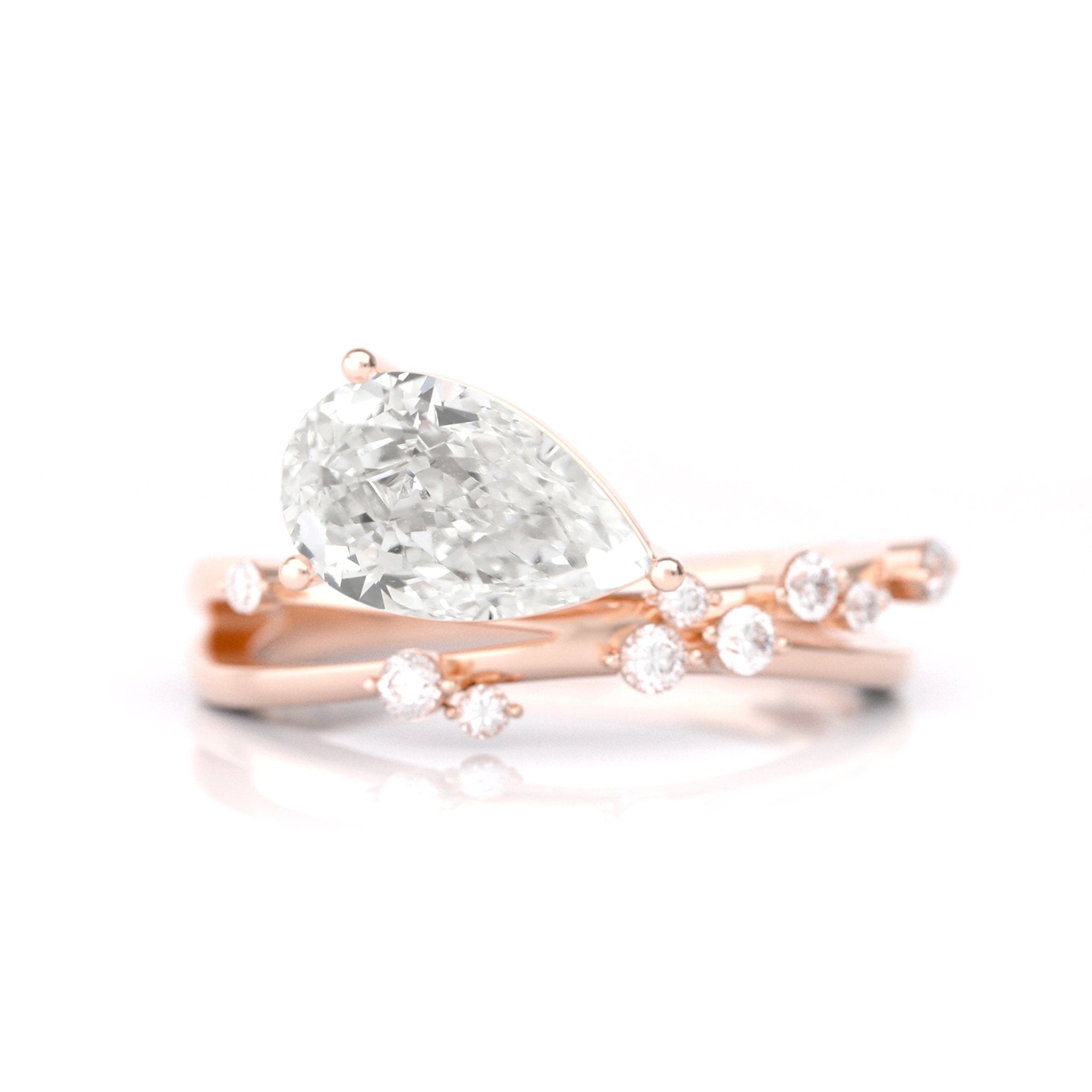 East - West Pear Shape with Crossover Shank Ring - MMR