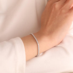 Round Brilliant Cut Diamond 4 - Prong Basket Tennis Bracelet with Single - Side Box Clasp - MMR