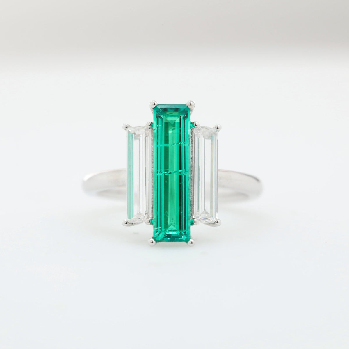 14K White Gold Baguette Cut Emerald Three Stone Ring with Lab Diamond Side-stones - MMR