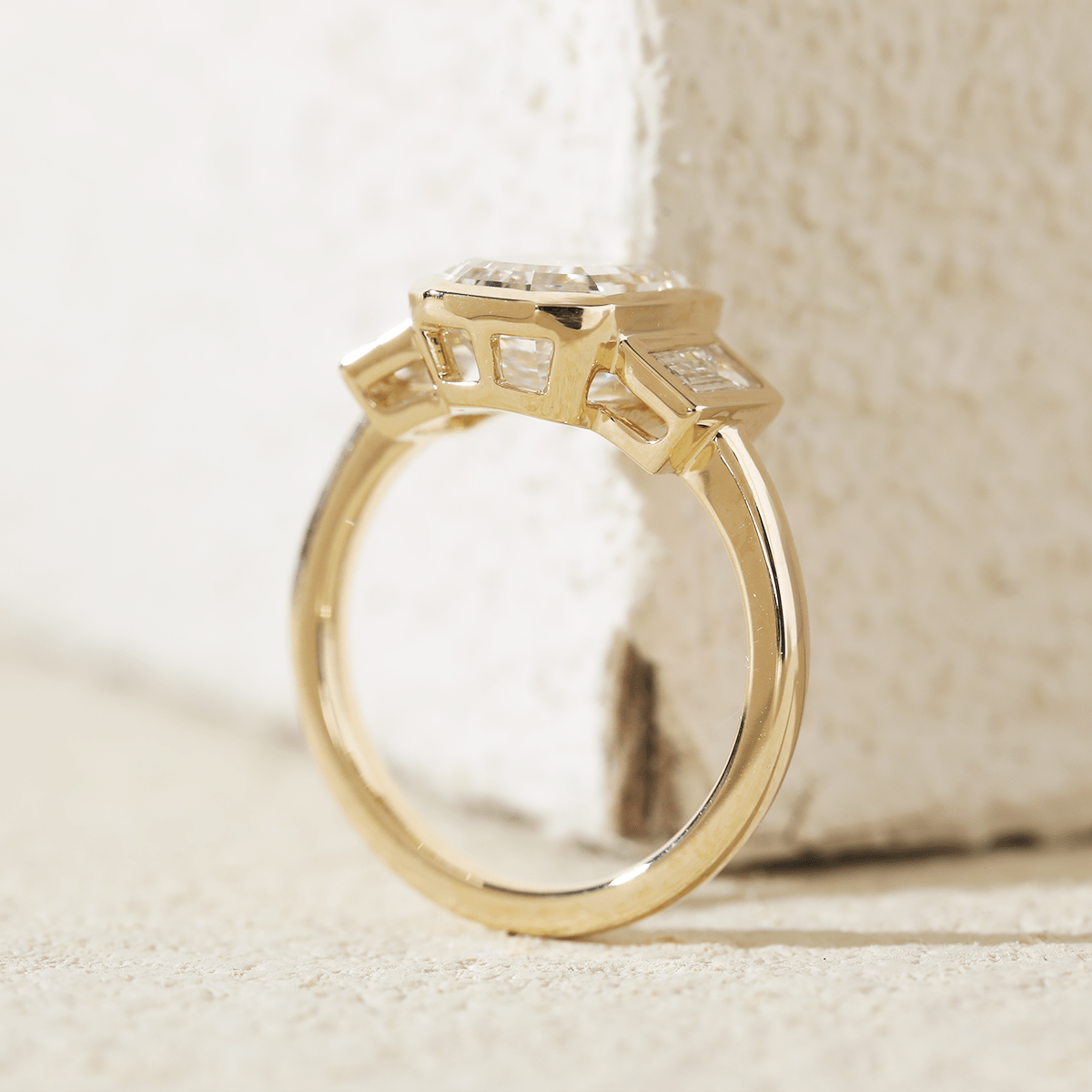 14K Yellow Gold 3ct Antique Emerald Cut Lab Diamond Bezel Three Stone Ring with Baguette Cut Lab Diamond Side - stones - MMR