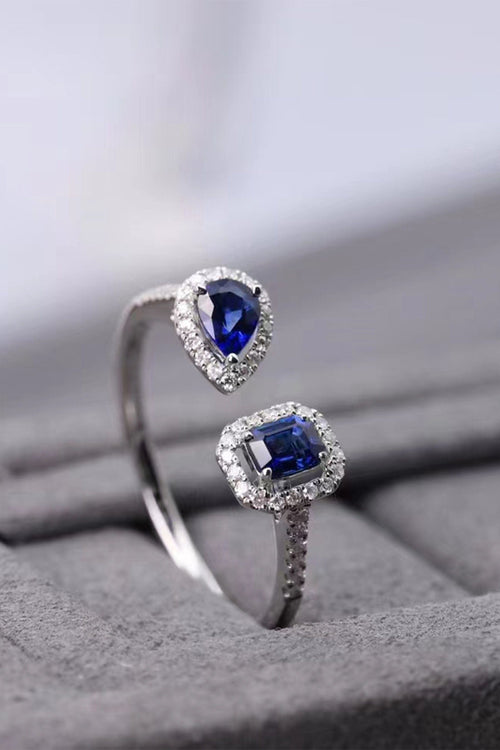 18K White Emerald Cut & Pear-shaped Sapphire Ring