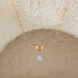 14K Rose Gold Wing Pendant Necklace with Round Lab Diamond in A Diamond-Cut Texture Halo