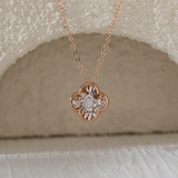 14K Rose Gold Clover Pendant Necklace with Round Lab Diamond in A Diamond-Cut Texture Halo