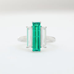 14K White Gold Baguette Cut Emerald Three Stone Ring with Lab Diamond Side-stones