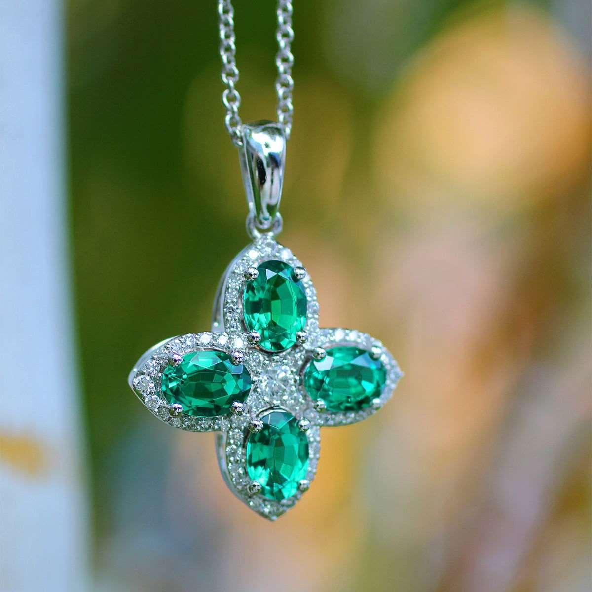 Platinum Oval Cut Lab Colombian Emerald Four-leaf Clover Lab Diamond Halo Necklace