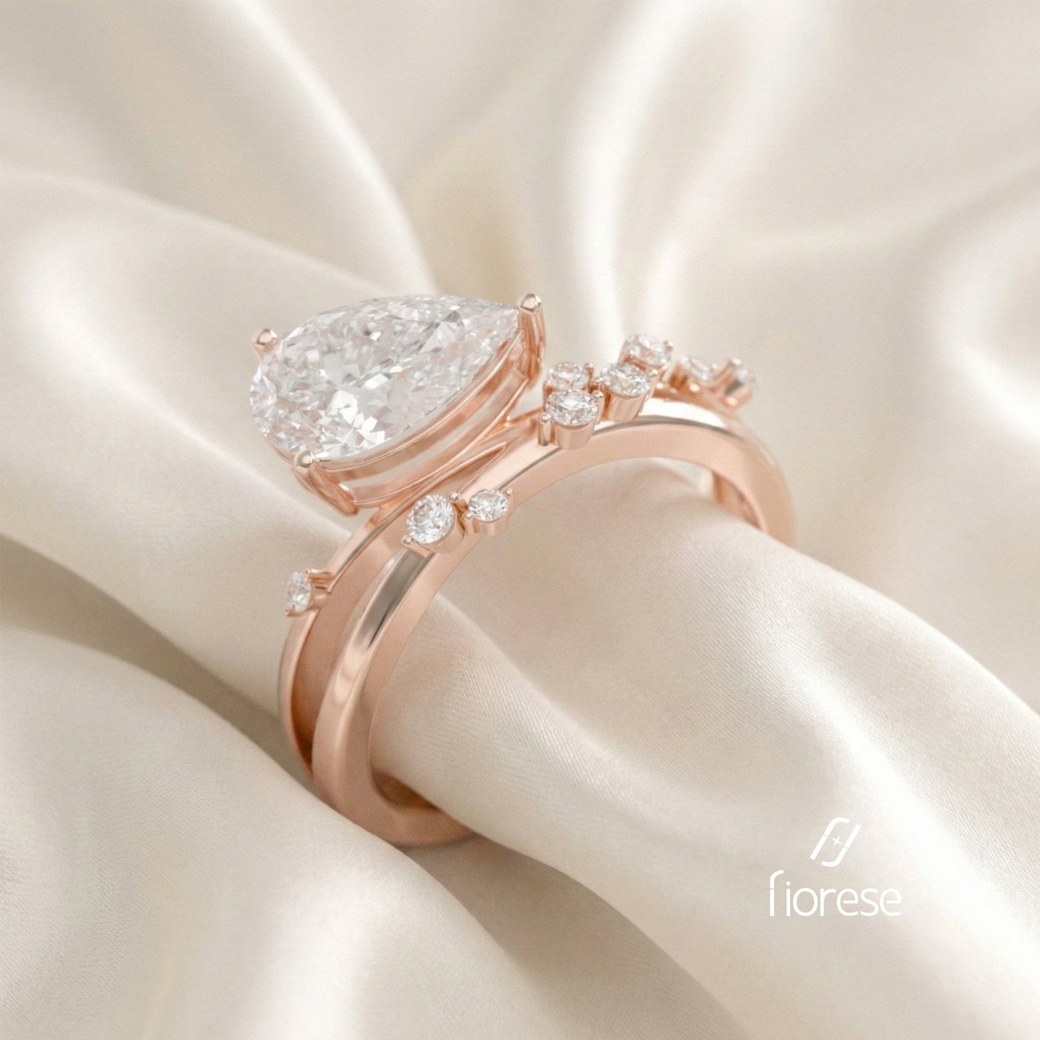 East - West Pear Shape with Crossover Shank Ring - MMR