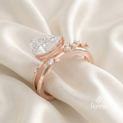 East - West Pear Shape with Crossover Shank Ring - MMR