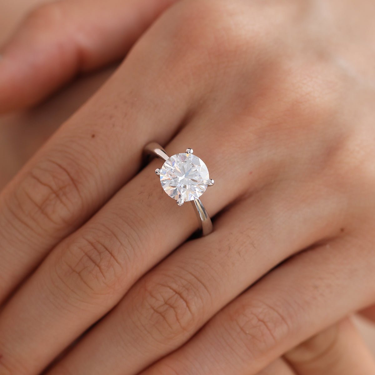 Platinum 3ct Round Lab Diamond 4 Round Prong Basket Solitaire Ring with Tapered Band Design - MMR